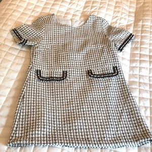 Tweed shift dress Black and White with a little sparkle. Hits mid thigh on 5’9”